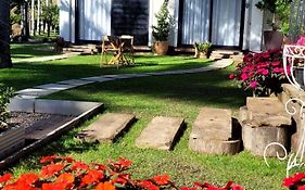 Suítes Villa Pomerode Hospedagem - Conforto e aconchego conectados com a Natureza